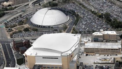 The Civic Arena, in back, and the new Consol Energy Center