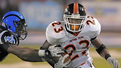 Bethel Park's Bre Ford heads for the end zone in a game against Woodland Hills.
