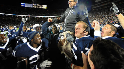 Penn State  head coach Joe Paterno gets carried off the field after getting his 400th career win against Northwestern at Beaver Stadium in University Park, Pa. Saturday.