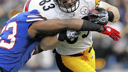 Steelers' tight end Heath Miller is hit by the Bills' Reggie Torbor during a game last month in Buffalo.
