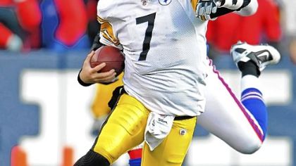 Steelers quarterback Ben Roethlisberger runs for a first down against the the Bills last Sunday. He injured his foot in the game, which now is said to be broken.