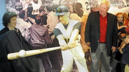 Bill Mazeroski looks at a statue of himself hitting the World Series-winning home run in 1960 at the opening of the Beat 'Em Bucs exhibit Monday at the Western Pennsylvania Sports Museum.