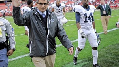 Penn State head coach Joe Paterno waves to the crowd as he leaves the field after beating Indiana 41-24 Saturday at Fedex Field in Landover, Md.
