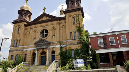 Heavenly Vision Ministries and parsonage, formerly known as the Our Lady Help of Christians in the Larimer section of Pittsburgh, has a 6,000-square-foot rectory and a banquet hall in the lower level. It's on the market for $169,900.