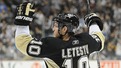 Penguins forward Mark Letestu celebrates his first period goal.
