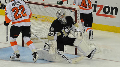 Flyers forwards Ville Leino and Danny Briere celebrate after scoring a first goal against Penguins goaltender Marc-Andre Fleury.