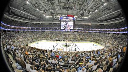 The puck is dropped to start the first NHL hockey game to be played in the new home of the Penguins, the Consol Energy Center, against the Detroit Red Wings in a preseason game September.