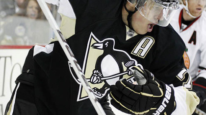 Penguins forward Evgeni Malkin skates during a second-period power play.