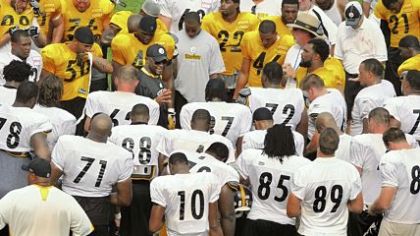 Mike Tomlin gathers the team around him at the end of practice Wednesday. It was the final day for two-a-day practices this week as the team prepares for Saturday night's preseason opener vs. Detroit at Heinz Field.