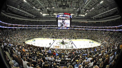 The puck is dropped to start the first NHL hockey game to be played in Consol Energy Center.
