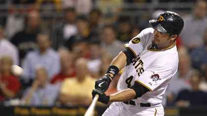 The Pirates' Garrett Jones hits a double to drive in a run in the third inning.