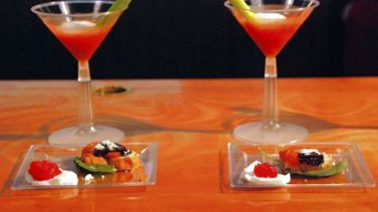 Bloody Shame cocktail is thickened tomato juice foam with celery "air" float. On the plates, fresh tomato pulp mousse over mozzarella di bufala; tomato basil soup sphere, balsamic vinegar sheet and olive oil powder on crostini with basil leaf.