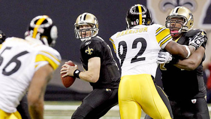 New Orleans Saints quarterback Drew Brees looks to pass during the first quarter of Sunday's win against the Steelers.