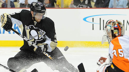 Flyers goaltender Sergei Bobrovsky stops shot by Penguins defenseman Alex Goligoski.