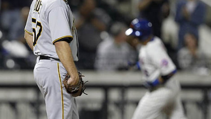 Pirates starting pitcher Zach Duke  looks toward the outfield as the Mets' Carlos Beltran rounds the bases after hitting a third-inning solo home run during Tuesday's game at Citi Field in New York.
