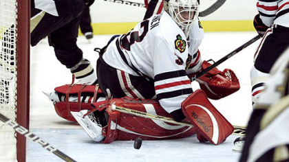 Blackhawks goaltender Hannu Toivonen makes a save.