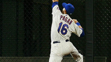 Mets outfielder Angel Pagan is unable to catch a triple hit by the Pirates' Pedro Alvarez.