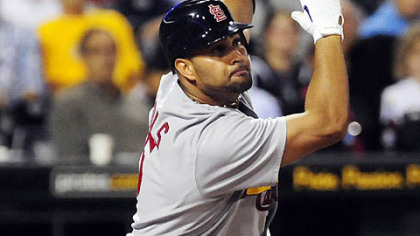 Cardinals slugger Albert Pujols hits a double in the fifth inning Monday at PNC Park.