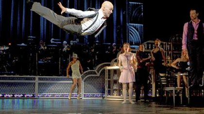 Charlie Neshyba-Hodges takes to the air in "Come Fly Away."