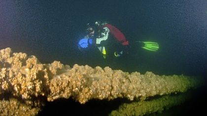 Diver Dave Miller explores the wreck of the schooner Washington Irving during a dive in June in Lake Erie. Cold water and other challenges require wreck divers to be highly skilled.