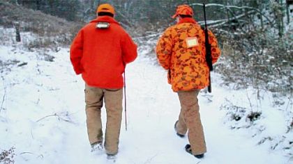 Father Mike Zavage, 28, right, hunts with his father, Mike Zavage, 55, of Carmichaels, Greene County, in Oak Forest, Greene County.