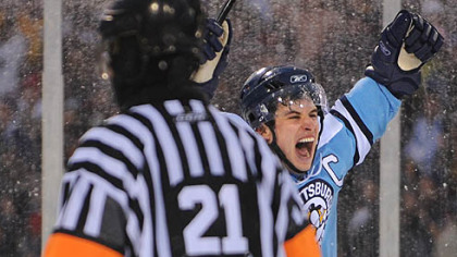 Penguins captain Sidney Crosby celebrates the winning shootout goal in the 2008 Winter Classic at Ralph Wilson Stadium in Orchard Park, N.Y.