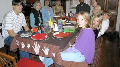 Above: Jean Peterson made this Thanksgiving tablecloth years ago for her parents; on the border it features the appliqued handprints of family members.