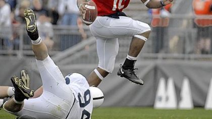 Penn State's Paul Jones, a Sto-Rox graduate, avoids a tackle by teammate Mikel Berry during the first half of the team's Blue-White intrasquad spring college football game in State College in April.