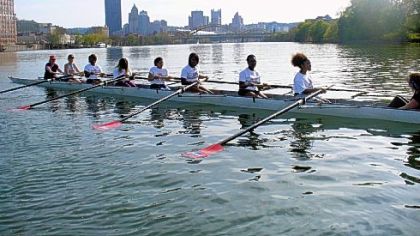Susan Godfrey, Lexi Joachim, Tyler Jerry, Sheryl Sesay, Pearl Mackey, Katlin Thomas, Shawnkeela Hawkins, Kyrah Dwyer and Jocelyn Horner practice rowing.