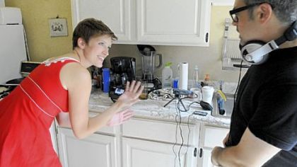 Amanda Blair, 29, of Lawrenceville discusses a shot with videographer Justin Crimone, 37, of Squirrel Hill while filming in Squirrel Hill for the 48 Hour Film contest in Squirrel Hill. They are entered in the dark-comedy category.