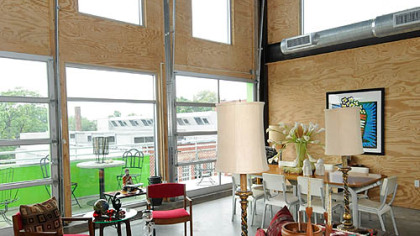 The soaring two-story front room in loft A301 was decorated by LeMix! It is in the Glass Lofts on Penn Ave. in Pittsburgh's Garfield neighborhood.
