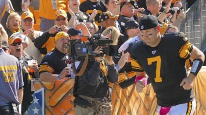 Quarterback Ben Roethlisberger heads onto the field for his first game since being suspended four games for violating the league's personal conduct policy.