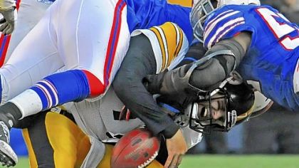 Ben Roethlisberger is sacked by the Bills' Arthur Moats Sunday at Ralph Wilson Stadium in Orchard Park, N.Y.