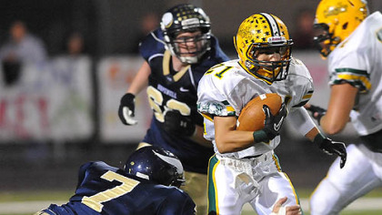 Blackhawk's Brandon Mansell is tackled by Hopewell's Brett Reisker.