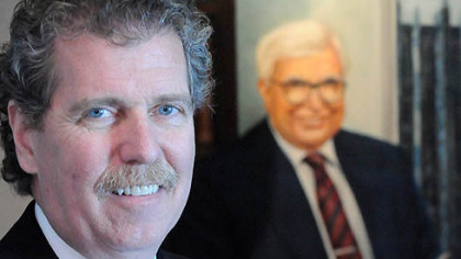 Tucker Arensberg shareholder Gary Hunt is president of the Allegheny County Bar Association. The portrait behind him is Richard B. Tucker Jr., one of the firm's founders.