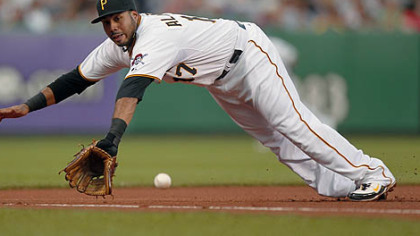Third baseman Pedro Alvarez makes an outstanding diving stop to rob the Marlins' Cody Ross in the fourth inning Thursday at PNC Park. Alvarez threw Ross out from his knees.