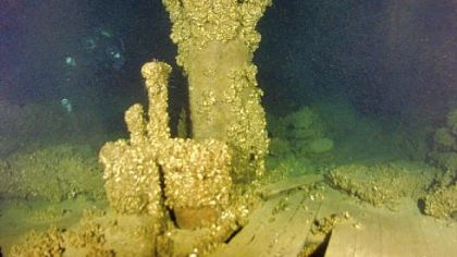 A barnacle-encrusted pump on the wreck of the barquentine Indiana.