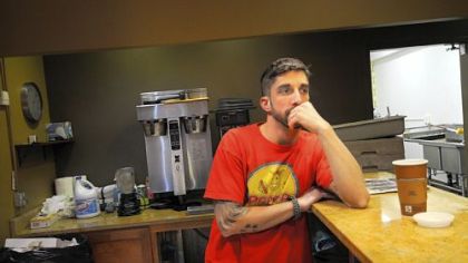 Dave Racicot pauses during clean-up of the Oakmont space that will become his new restaurant, Notion.