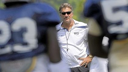 Coach Dave Wannstedt begins the player evaluation process today in Pitt's first scrimmage.