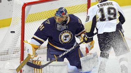 Blues goalie Jaroslav Halak made 31 saves Saturday night, including this one on Mike Comrie in the second period.