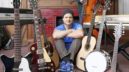 Brad Yoder (guitars, keys, banjo, glockenspiel) and Jason Rafalak (bass, mandolin) with some of the instruments they played on "Excellent Trouble."