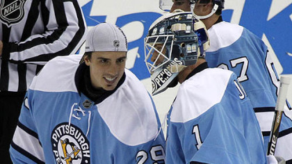 Penguins goaltenders Brent Johnson, right, and Marc-Andre Fleury.