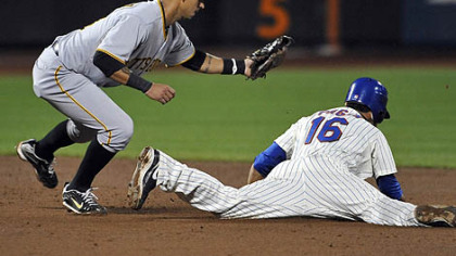 The Mets' Angel Pagan is caught trying to steal second base by Pirates shortstop Ronny Cedeno.