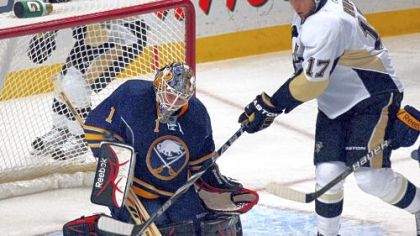 Buffalo backup goalie Jhonas Enroth was almost a match for the Penguins, allowing only one goal Wednesday night at HSBC Arena in Buffalo. He stops a re-direction by Mike Rupp in the first period