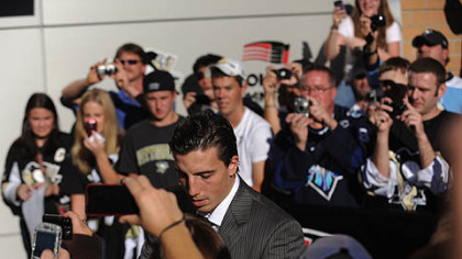 Penguins goaltender Marc-Andre Fleury arrive outside Consol Center prior to the game.