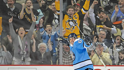 Penguins forward Sidney Crosby celebrates his first goal in the second period of Friday's game against the Flames at Consol Energy Center.