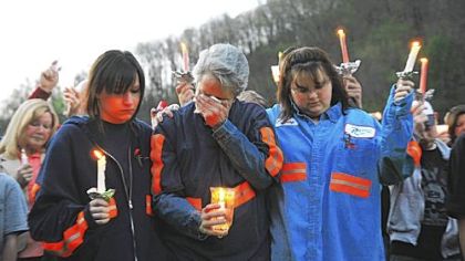 Hundreds of mourners gathered April 10 for a candlelight vigil at Marsh Folk Elementary School in Raleigh County, W.Va., for the 29 miners killed in an explosion at the Upper Big Branch mine.