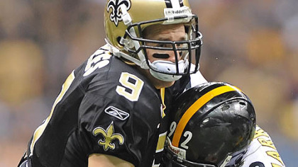 James Harrison sacks Saints quarterback Drew Brees in the first half Sunday in New Orleans. Harrison was fined $25,000 by the NFL for a different hit on Brees in the same game.