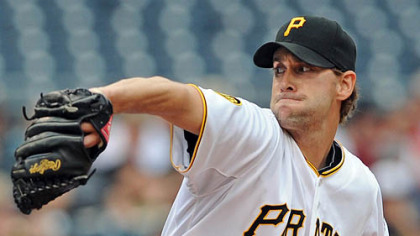Starter Brian Burres delivers against the Braves Monday afternoon.