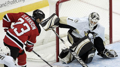 Penguins goaltender Brent Johnson makes a save on a shot by Devils forward David Clarkson during the second period.